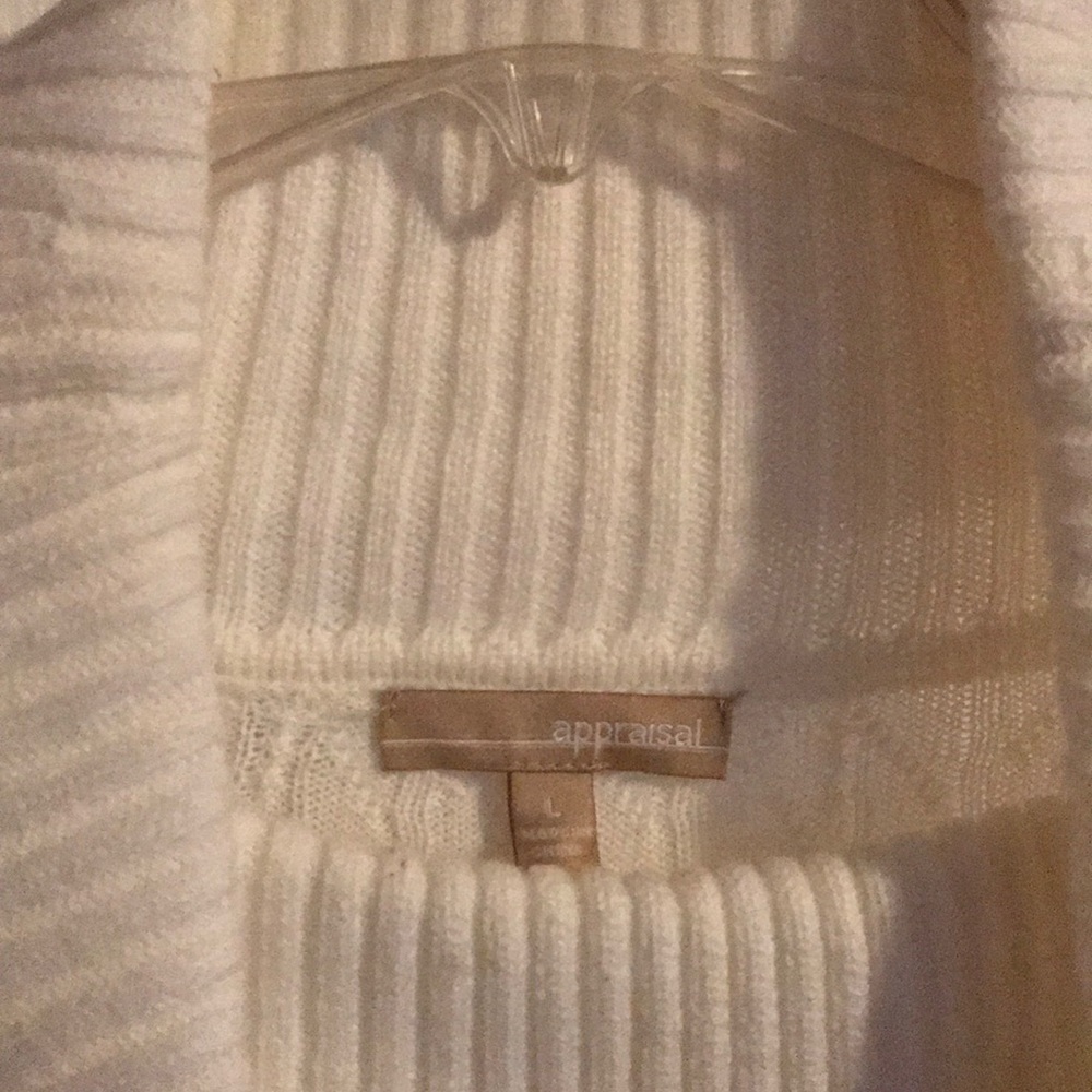 Ivory sweater dress with 2 buckles on the side